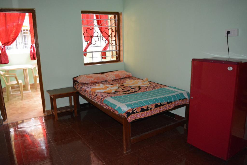 Vailankanni Guesthouse Morjim Quarto foto